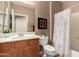 Clean bathroom with single sink, wood cabinet, and tub shower combo at 157 W Latigo Cir, San Tan Valley, AZ 85143