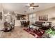 Open dining area with a glass table and four leather chairs at 157 W Latigo Cir, San Tan Valley, AZ 85143