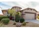 Charming one-story home with a two-car garage and xeriscaping at 157 W Latigo Cir, San Tan Valley, AZ 85143