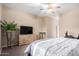 Comfortable bedroom with a dresser and ceiling fan at 1603 E Zion Way, Chandler, AZ 85249