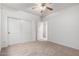 Well-lit bedroom with double door closet and ceiling fan at 1603 E Zion Way, Chandler, AZ 85249