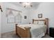 Bedroom with wooden bed frame and ceiling fan at 1603 E Zion Way, Chandler, AZ 85249