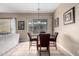 Charming dining area with granite table and four chairs at 1603 E Zion Way, Chandler, AZ 85249