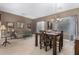 Dining room with dark wood table, chandelier, and neutral decor at 1603 E Zion Way, Chandler, AZ 85249