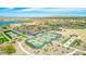 Aerial view of community amenities including a lake, pickleball courts, and clubhouse at 16789 S 181St Ln, Goodyear, AZ 85338