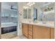 Double vanity bathroom with a large shower at 16789 S 181St Ln, Goodyear, AZ 85338