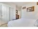 Bedroom with double doors and built-in dresser at 16789 S 181St Ln, Goodyear, AZ 85338