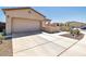 Two-car garage with ample driveway space in front at 16789 S 181St Ln, Goodyear, AZ 85338