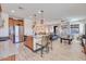 Open kitchen with island, stainless steel appliances, and wood cabinets at 16789 S 181St Ln, Goodyear, AZ 85338