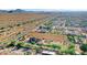 Aerial view of property showing house, expansive lot, and neighborhood at 17642 E Hunt Hwy, Queen Creek, AZ 85142