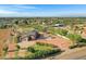 Aerial view of house, expansive lot, and surrounding area at 17642 E Hunt Hwy, Queen Creek, AZ 85142