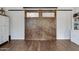 Custom barn doors separating rooms at 17642 E Hunt Hwy, Queen Creek, AZ 85142