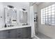 Modern bathroom with double vanity and walk-in shower at 17642 E Hunt Hwy, Queen Creek, AZ 85142