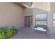 Inviting front entry with red door and brick patio at 17642 E Hunt Hwy, Queen Creek, AZ 85142