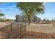 Attractive home exterior with landscaping and a charming bridge at 17642 E Hunt Hwy, Queen Creek, AZ 85142