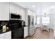 Kitchen with stainless steel appliances and a breakfast nook at 17642 E Hunt Hwy, Queen Creek, AZ 85142