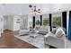 Light and airy living room with comfy seating at 17642 E Hunt Hwy, Queen Creek, AZ 85142