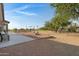 Relaxing patio with seating area and fire pit at 17642 E Hunt Hwy, Queen Creek, AZ 85142