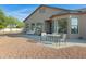 Spacious patio with seating area and partial house view at 17642 E Hunt Hwy, Queen Creek, AZ 85142