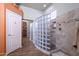 Bathroom with glass block shower and modern fixtures at 17721 N Canal Dr, Surprise, AZ 85374