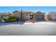 Single-story home with desert landscaping and a two-car garage at 17721 N Canal Dr, Surprise, AZ 85374