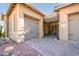 Covered entry to garage with a pergola and brick pavers at 17721 N Canal Dr, Surprise, AZ 85374