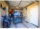 Garage with golf cart, storage, and room for tools at 17721 N Canal Dr, Surprise, AZ 85374