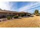 Landscaped backyard with a covered patio area at 17811 N Boswell Blvd, Sun City, AZ 85373