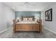 Main bedroom with king-size bed and ceiling fan at 17811 N Boswell Blvd, Sun City, AZ 85373