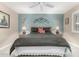 Spacious bedroom with ceiling fan and large bed at 17811 N Boswell Blvd, Sun City, AZ 85373