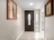 Bright entryway with tile flooring and elegant door at 17811 N Boswell Blvd, Sun City, AZ 85373