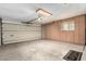 Garage with storage cabinets and opener at 17811 N Boswell Blvd, Sun City, AZ 85373