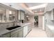 Updated kitchen featuring skylights and stainless steel appliances at 17811 N Boswell Blvd, Sun City, AZ 85373