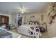 Main bedroom with a king-size bed, ample closet space, and a ceiling fan at 1826 S 363Rd Ave, Tonopah, AZ 85354