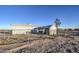 House exterior with fenced backyard and a covered patio area at 1826 S 363Rd Ave, Tonopah, AZ 85354