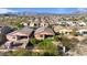 Aerial view of houses with desert landscape and mountain backdrop at 18311 E San Ignacio Ct, Gold Canyon, AZ 85118