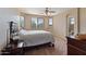 Spacious bedroom with carpeted floor and large windows at 18311 E San Ignacio Ct, Gold Canyon, AZ 85118