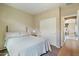 Bright bedroom with a queen-size bed and double-door closet at 18311 E San Ignacio Ct, Gold Canyon, AZ 85118