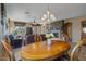 Open dining area with a view of living room and fireplace at 18311 E San Ignacio Ct, Gold Canyon, AZ 85118