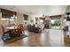 Open concept dining area with a wooden table and chairs at 18311 E San Ignacio Ct, Gold Canyon, AZ 85118