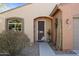 Front entrance with security door and walkway at 18311 E San Ignacio Ct, Gold Canyon, AZ 85118