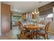 Kitchen with an island, stainless steel appliances, and wood cabinets at 18311 E San Ignacio Ct, Gold Canyon, AZ 85118