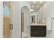 Elegant bathroom with a large mirror, modern vanity, and glass shower at 18702 E Gemmill Dr, Rio Verde, AZ 85263