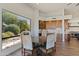 Bright breakfast nook features a round table and chairs, plus access to the kitchen at 18702 E Gemmill Dr, Rio Verde, AZ 85263