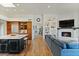 Modern kitchen with large island, stainless steel appliances, and wooden cabinetry at 18702 E Gemmill Dr, Rio Verde, AZ 85263