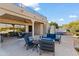 Spacious patio with seating area and fire pit at 18702 E Gemmill Dr, Rio Verde, AZ 85263