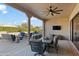 Covered patio with outdoor dining area and seating at 18702 E Gemmill Dr, Rio Verde, AZ 85263