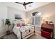 Cozy bedroom with an antique-style bed and a built-in desk at 19019 E Via Hermosa --, Rio Verde, AZ 85263