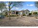 Single-story home with desert landscaping and a large front yard at 19019 E Via Hermosa --, Rio Verde, AZ 85263