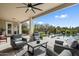 Inviting covered patio with comfortable seating overlooking the pool and backyard at 19019 E Via Hermosa --, Rio Verde, AZ 85263